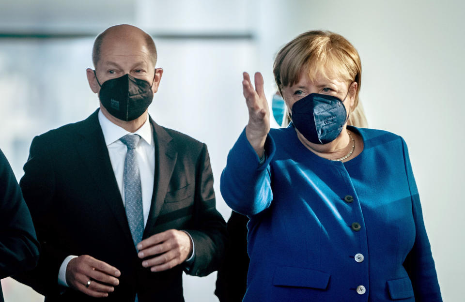 Olaf Scholz und Angela Merkel. (Bild: Kay Nietfeld - Pool/Getty Images)