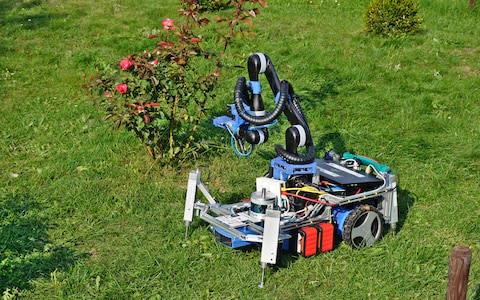 The mobile arm has been fitted to a Bosch remote lawn mower - Credit: The University of Edinburgh