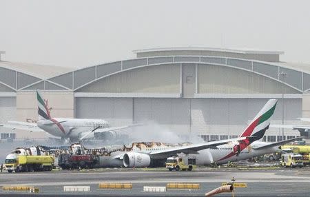 An Emirates Airline flight is seen after it crash-landed at Dubai International Airport, the UAE August 3, 2016. REUTERS/Stringer