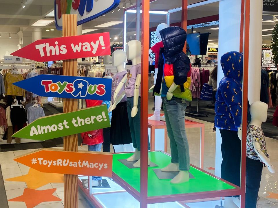 Toys 'R' Us direction signs.