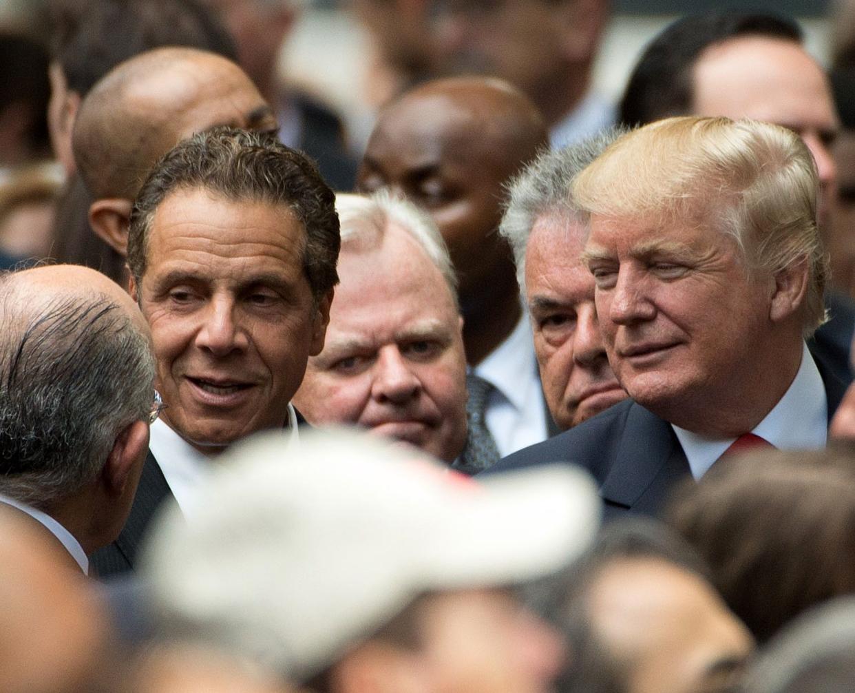 New York Governor Andrew Cuomo (left) and (as then-Republican presidential candidate Donald Trump (right) at the 15th anniversary of September 11 at the 9/11 Memorial and Museum in Lower Manhattan, New York on Sep. 11, 2016. 