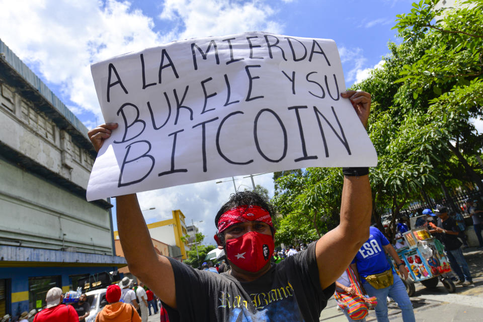 SAN SALVADOR, EL SALVADOR - SEPTEMBER 15: A demonstrators holds a sign that reads 