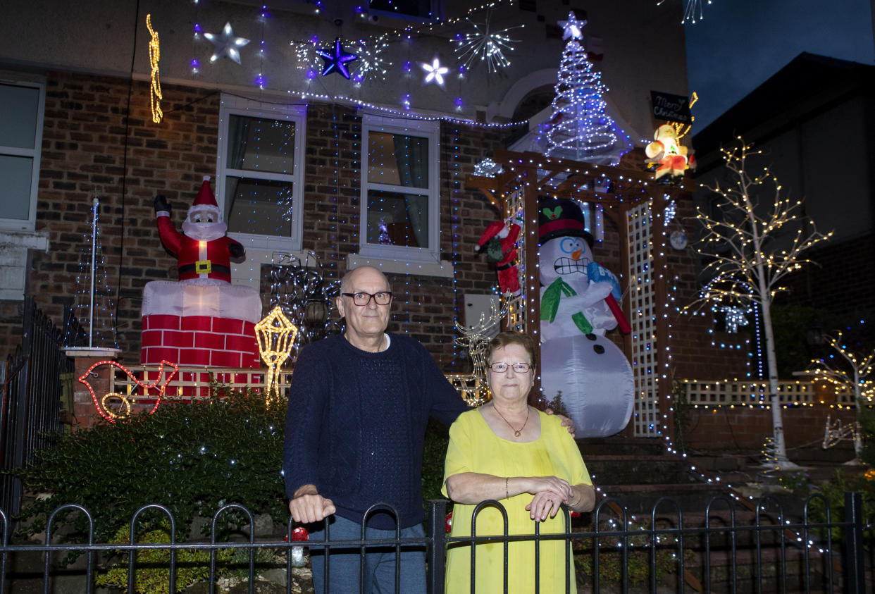 Christmas lights are up on the home of Ian and Helen Cochran in Hamilton (Picture: SWNS)