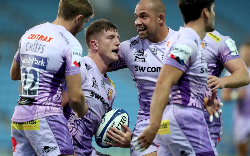 Exeter Chiefs's Jacques Vermeulen celebrates scoring his side's fifth try during the Heineken Champions Cup quarter final match at Sandy Park, Exeter. - PA