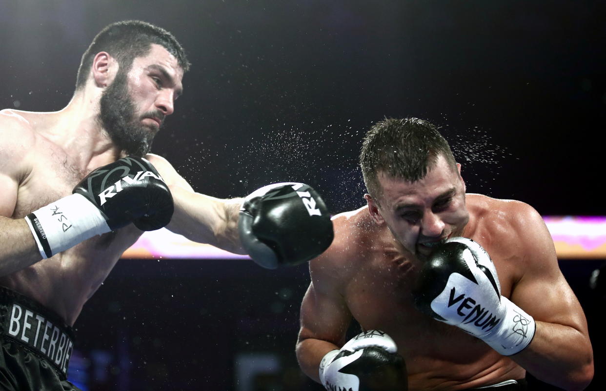 PHILADELPHIA, UNITED STATES - OCTOBER 19, 2019: IBF belt-holder Artur Beterbiev of Russia (L) and WBC titlist Oleksandr Gvozdyk of Ukraine compete in a light heavyweight world title unification boxing fight at the Liacouras Center in Philadelphia, Pennsylvania, United States. Valery Sharifulin/TASS (Photo by Valery Sharifulin\TASS via Getty Images)