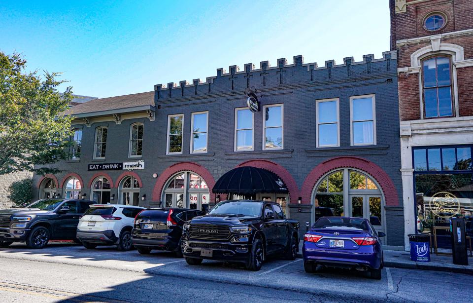 The buildings which currently houses Mesh on Massachusetts Avenue were formerly listed as Neerman Shoes in 1865, right, while the left side of the building is listed as around 1868-1869 on Friday, Oct. 6, 2023, in downtown Indianapolis.