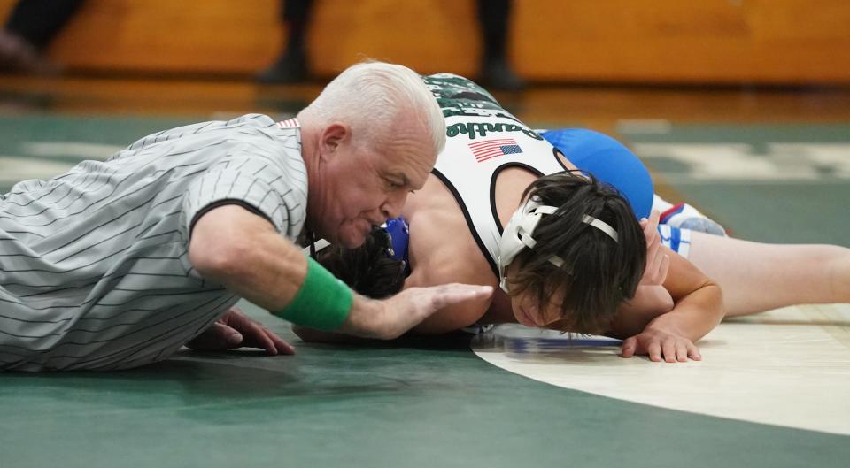 Pleasantville's Jesse Straus pins Pearl River's  Ryan Craig (PR) in the 118-pound match of the Section 1 Division II Dual Meet Tournament championship at Pleasantville High School in Pleasantville on Thursday, December 15, 2022.