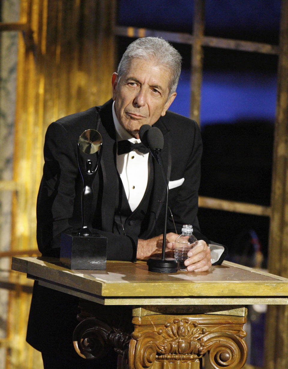 FILE - Leonard Cohen is inducted into the Rock and Roll Hall of Fame at the Rock and Roll Hall of Fame Induction Ceremony in New York, on March 10, 2008. Cohen is the subject of a documentary, "Hallelujah: Leonard Cohen, a Journey, a Song." (AP Photo/Jason DeCrow, File)