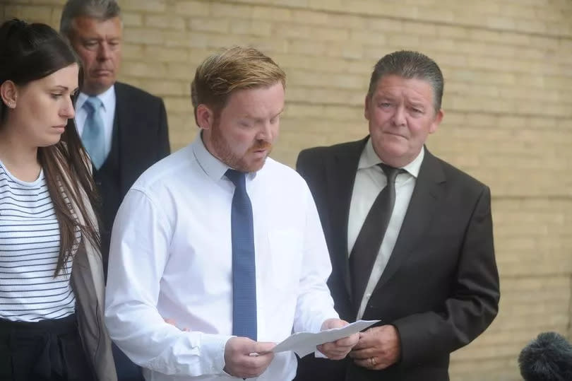 Daniel West reads a statement outside Cambridge Crown Court