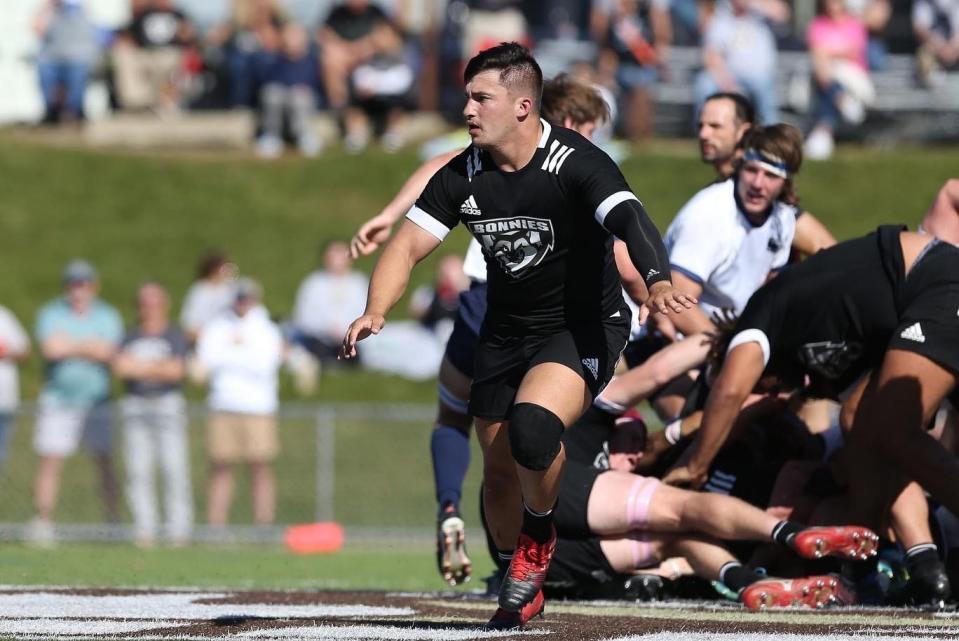 Hudson native Joe Hawthorne looks to make a tackle during a game with St. Bonaventure. Hawthorne was drafted by the San Diego Legion of Major League Rugby.