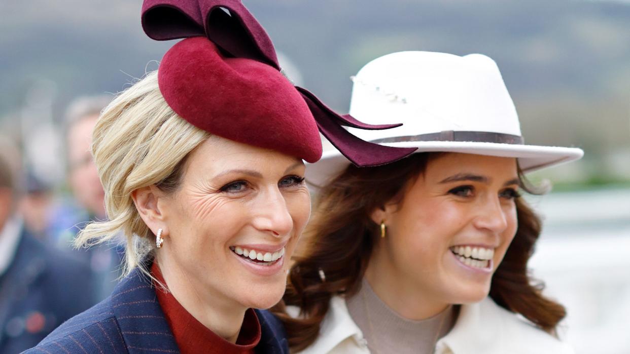 Zara Tindall and Princess Eugenie walk arm in arm