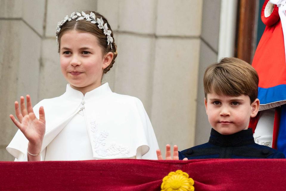<p>Pool/Samir Hussein/WireImage</p> Princess Charlotte and Prince Louis on the balcony of Buckingham Palace after King Charles and Queen Camilla
