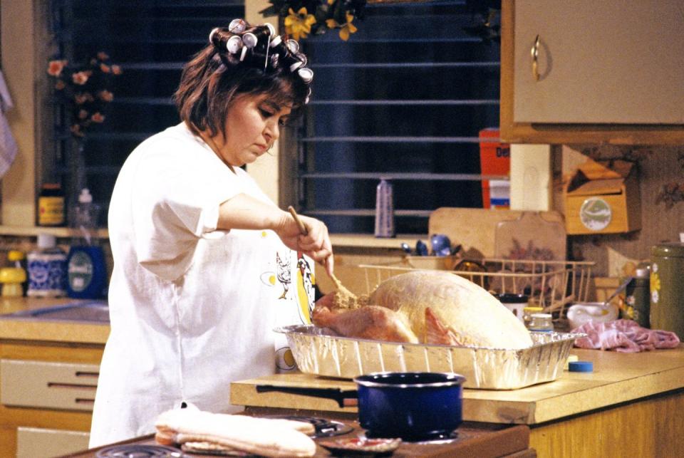 <p>"Here I am, 5 o'clock in the morning, stuffing bread crumbs up a dead bird's butt." — Roseanne</p>