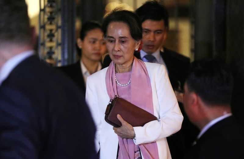 Myanmar's leader Aung San Suu Kyi leaves the International Court of Justice (ICJ), the top United Nations court, after court hearings in a case filed by Gambia against Myanmar alleging genocide against the minority Muslim Rohingya population, in The Hague