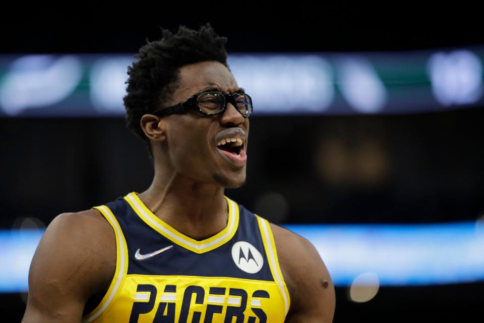 Indiana Pacers' Jalen Smith reacts to a call during the first half of an NBA basketball game against the Milwaukee Bucks Tuesday, Feb. 15, 2022, in Milwaukee.