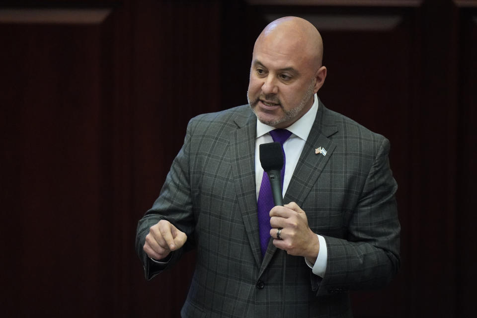State Rep. Blaise Ingoglia speaks about an immigration bill before its passage during a legislative session at the Florida State Capitol, Wednesday, March 9, 2022, in Tallahassee, Fla. All Florida government agencies would be barred from doing business with transportation companies that bring immigrants to the state who are in the country illegally under a bill sent to Gov. Ron DeSantis on Wednesday. (AP Photo/Wilfredo Lee)