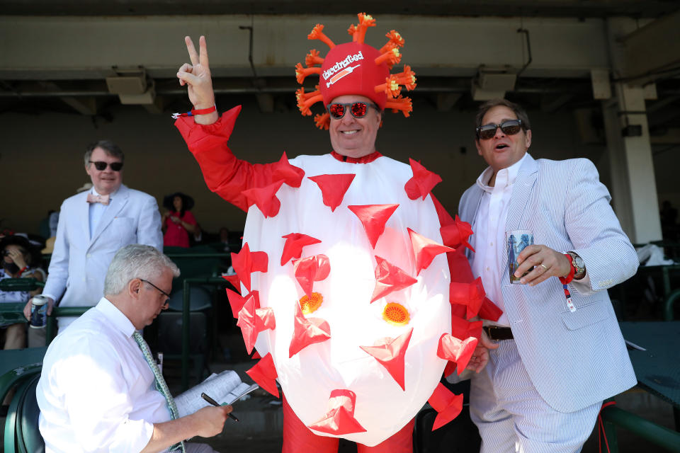 Kentucky Derby spectator Mark Ferguson of Dallas, Texas, wearing a COVID-19 costume at Saturday's event. (Photo: Jamie Squire via Getty Images)