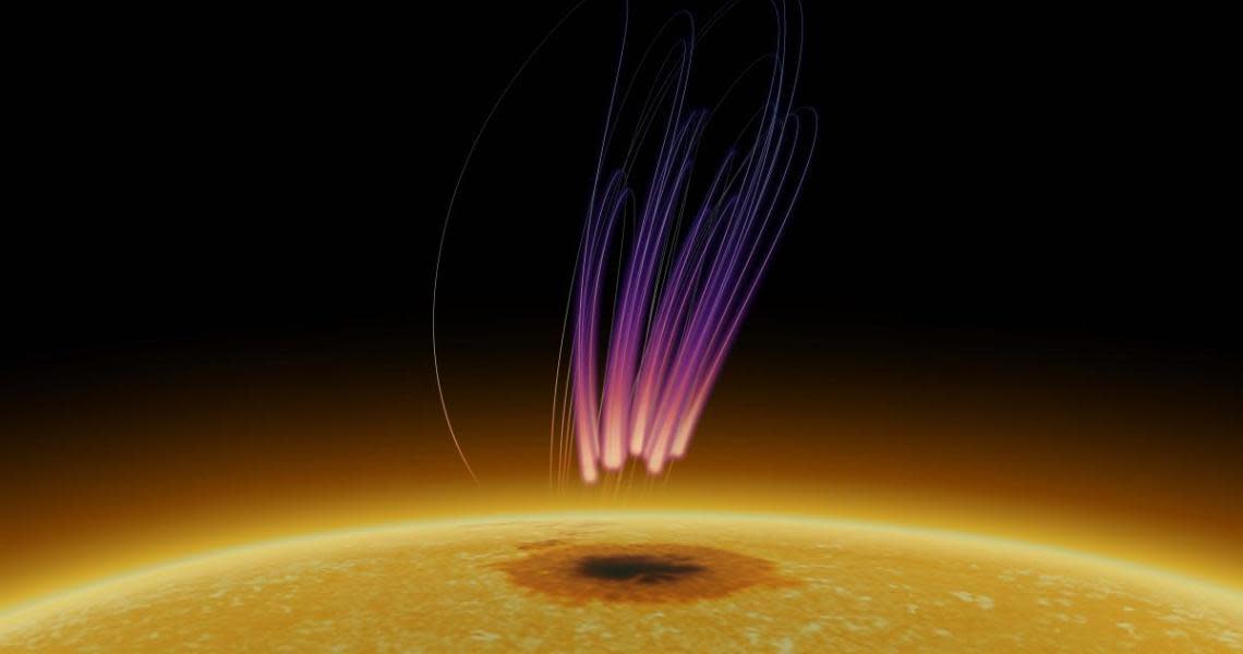 An illustration of the sun with a dark sunspot. Above the dark sunspot, there are several pinkish trails flowing vertically outward. 