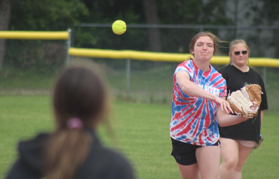 Inland Lakes sophomore Brooklyn LaBrecque makes a throw to third base during softball practice at Cooperation Park on Thursday. The Bulldogs travel to Rudyard to face Johannesburg-Lewiston in a 1 p.m. regional semifinal on Saturday.