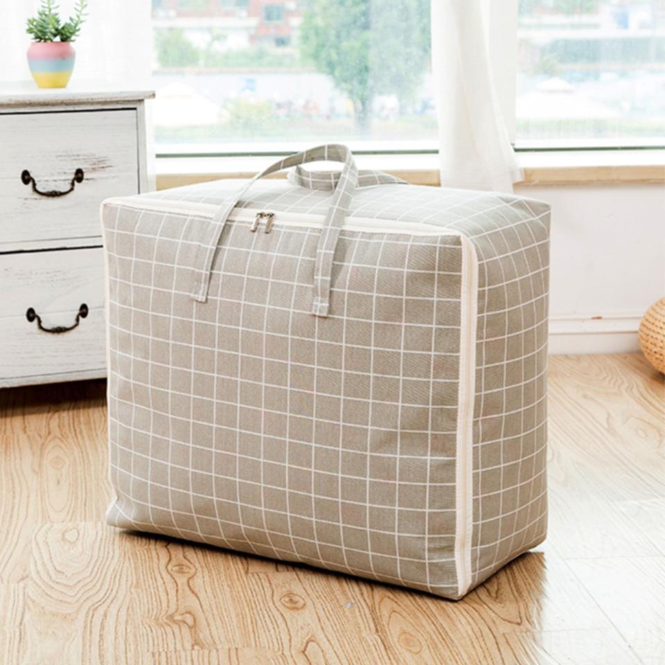 A grid-patterned storage bag on the floor