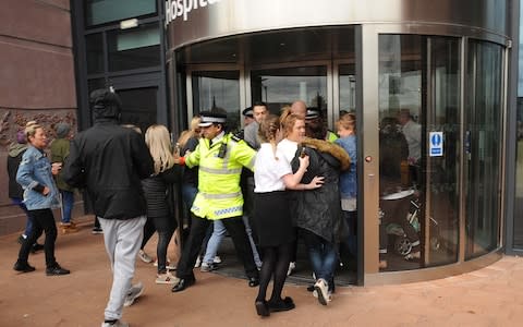 Police try and stop protesters getting into the hospital - Credit: CHRIS NEILL/MAVERICK PHOTOGRAPHY