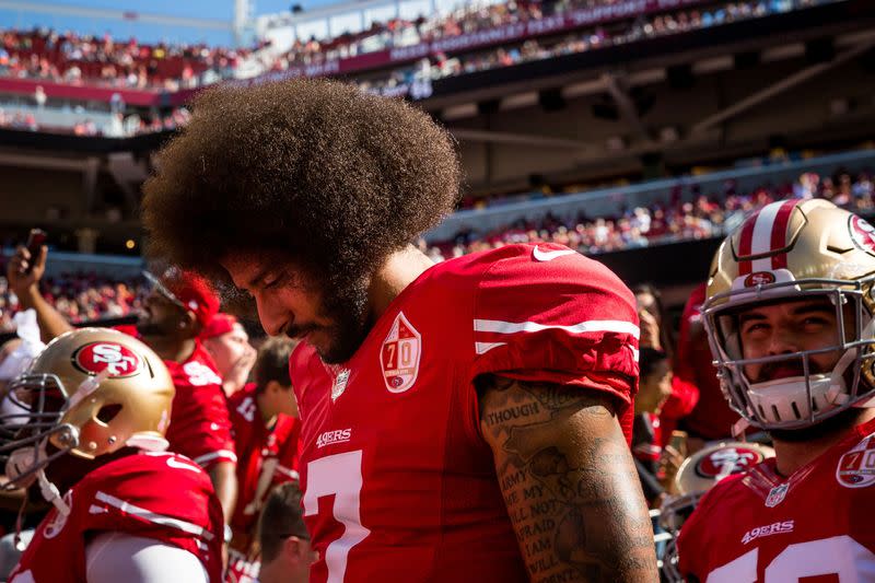 FILE PHOTO: San Francisco 49ers quarterback Colin Kaepernick prepares to take the field before an NFL game against the Tampa Bay Buccaneers at Levi's Stadium in Santa Clara