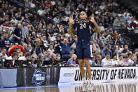 UConn guard Jordan Hawkins (24) celebrates after making a three-point basket in the second half of an Elite 8 college basketball game against Gonzaga in the West Region final of the NCAA Tournament, Saturday, March 25, 2023, in Las Vegas. (AP Photo/David Becker)