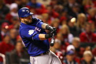 ST LOUIS, MO - OCTOBER 19: Mike Napoli #25 of the Texas Rangers hits a two-run homerun in the top of the fifth inning during Game One of the MLB World Series against the St. Louis Cardinals at Busch Stadium on October 19, 2011 in St Louis, Missouri. (Photo by Dilip Vishwanat/Getty Images)