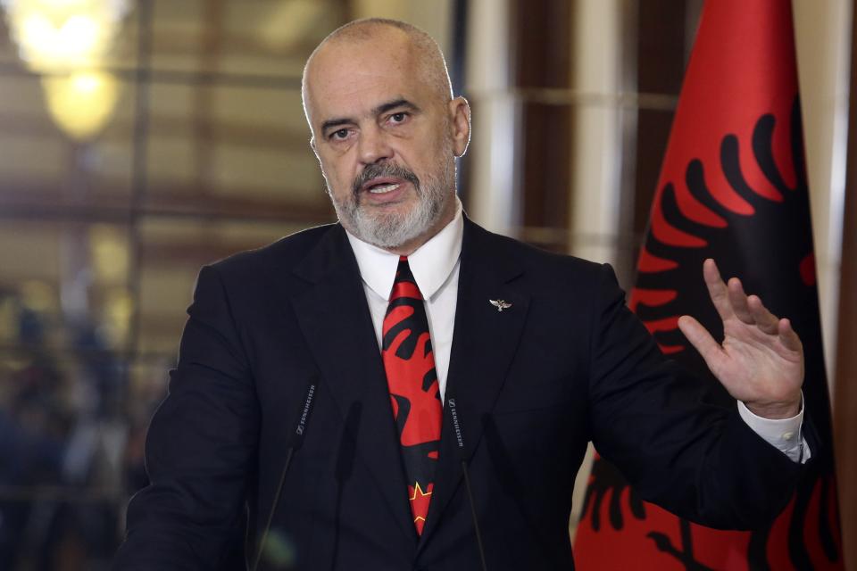 Albanian Prime Minister Edi Rama makes a statement with the Greek Foreign Minister Nikos Dendias after their meeting in Tirana, Tuesday, Oct. 20, 2020. Bilateral issues and maritime border delimitation in the Ionian Sea were the main topics of their discussion. (AP Photo/Hektor Pustina)