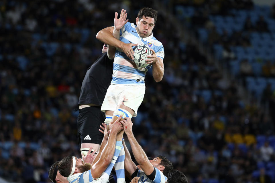 Argentina's Guido Petti, right, grabs a line out ball against New Zealand's Brodie Retallick during their Rugby Championship match on Sunday, Sept. 12, 2021, on the Gold Coast, Australia. (AP Photo/Tertius Pickard)