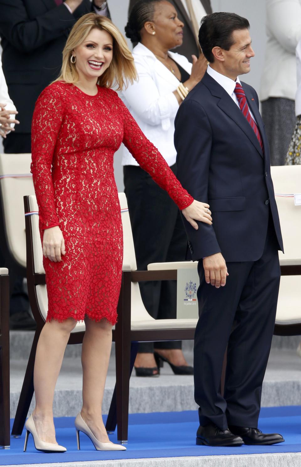 Mexico's President Enrique Pena Nieto and Mexico's First Lady Angelica Rivera arrive to attend the traditional Bastille Day military parade in Paris