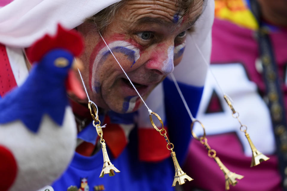 A fan of France cheers prior to the World Cup final soccer match between Argentina and France at the Lusail Stadium in Lusail, Qatar, Sunday, Dec. 18, 2022. (AP Photo/Natacha Pisarenko)