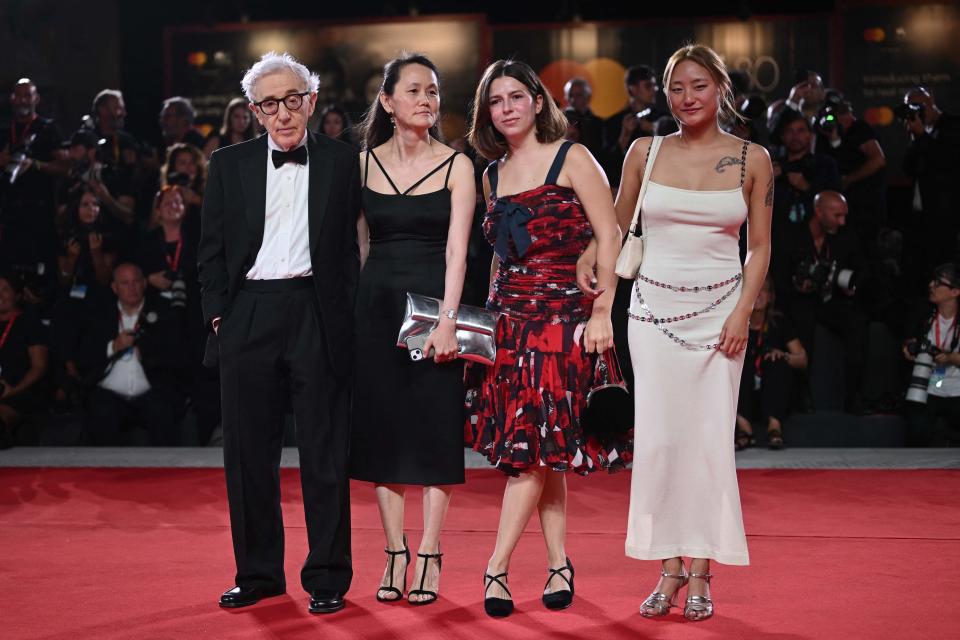 Woody Allen, from left, Soon-Yi Previn, Manzie Allen and Bechet Allen attend the red carpet premiere of Allen's film "Coup de Chance," presented out of competition at the 80th Venice Film Festival on Sept. 4, 2023, at Venice Lido.