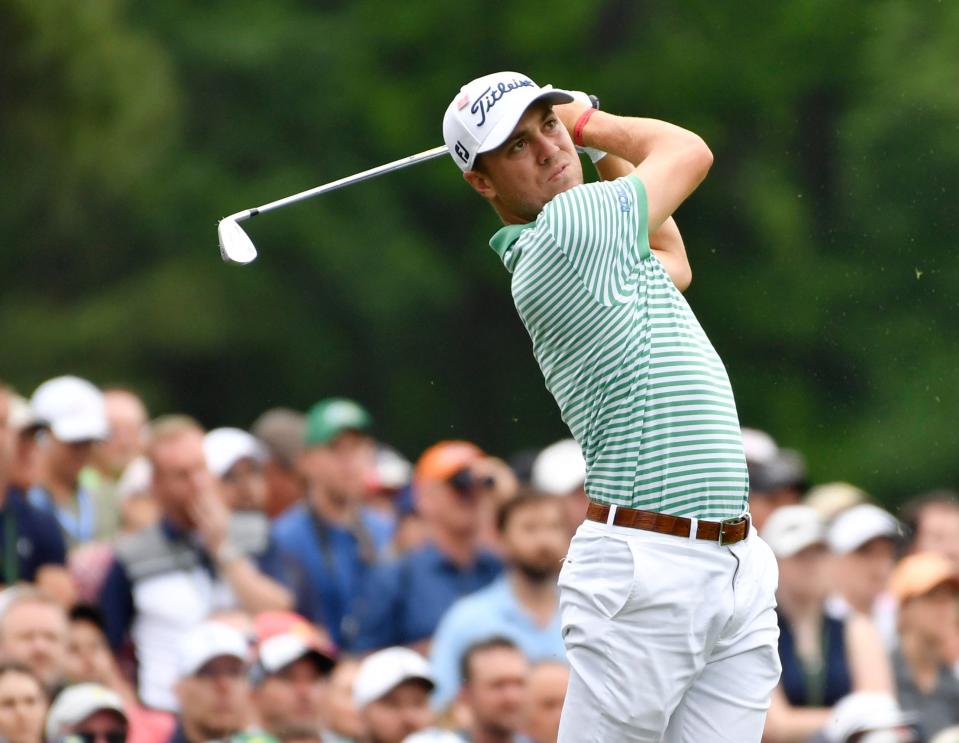 Justin Thomas hits his tee shot on the 12th hole during the final round of The Masters golf tournament at Augusta National Golf Club on Sunday, April 14, 2019.