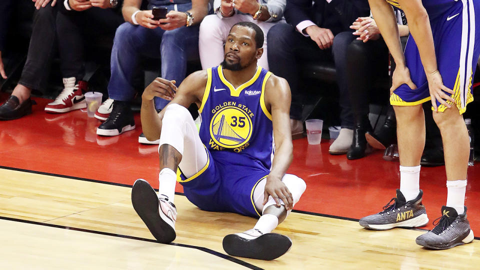 Kevin Durant injuring his archilles during game 5 of the NBA Finals. (Getty Images)