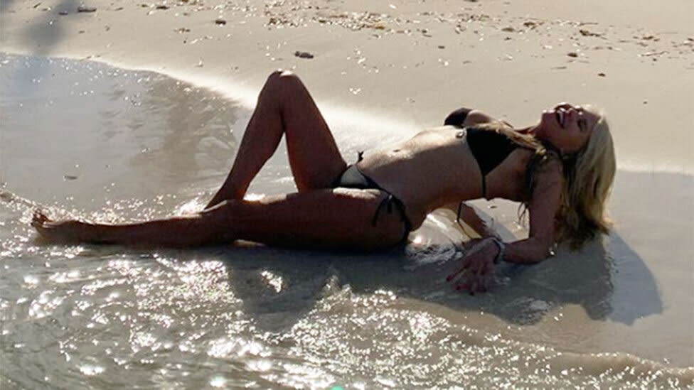 Model and actress Christie Brinkley in a bikini on the beach