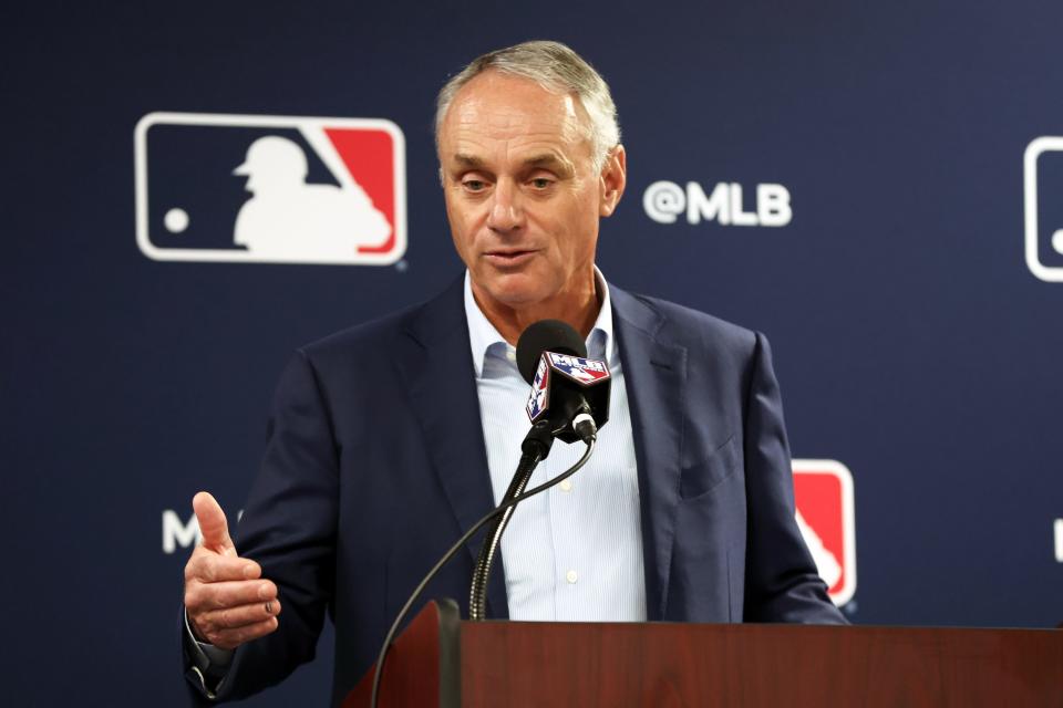MLB commissioner Rob Manfred talks with media at George M. Steinbrenner Field on Feb. 15, 2024.