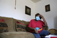 Marie Johnson talks about losing power and running water during a recent winter storm, Thursday, Feb. 25, 2021, inside her home in Houston. West Street Recovery, a nonprofit created in the wake of Hurricane Harvey to help repair flood damaged homes, has been working since the winter storm hit to repair and replace damaged plumbing systems for residents who can't afford to do so, like Johnson. (AP Photo/David J. Phillip)