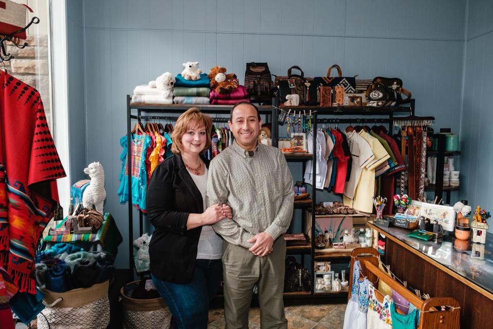 Hailey and Juan Diaz are shown in their store, De mi Tierra, in downtown Dover. it sells alpaca wool blankets and other items imported from Spanish-speaking countries.