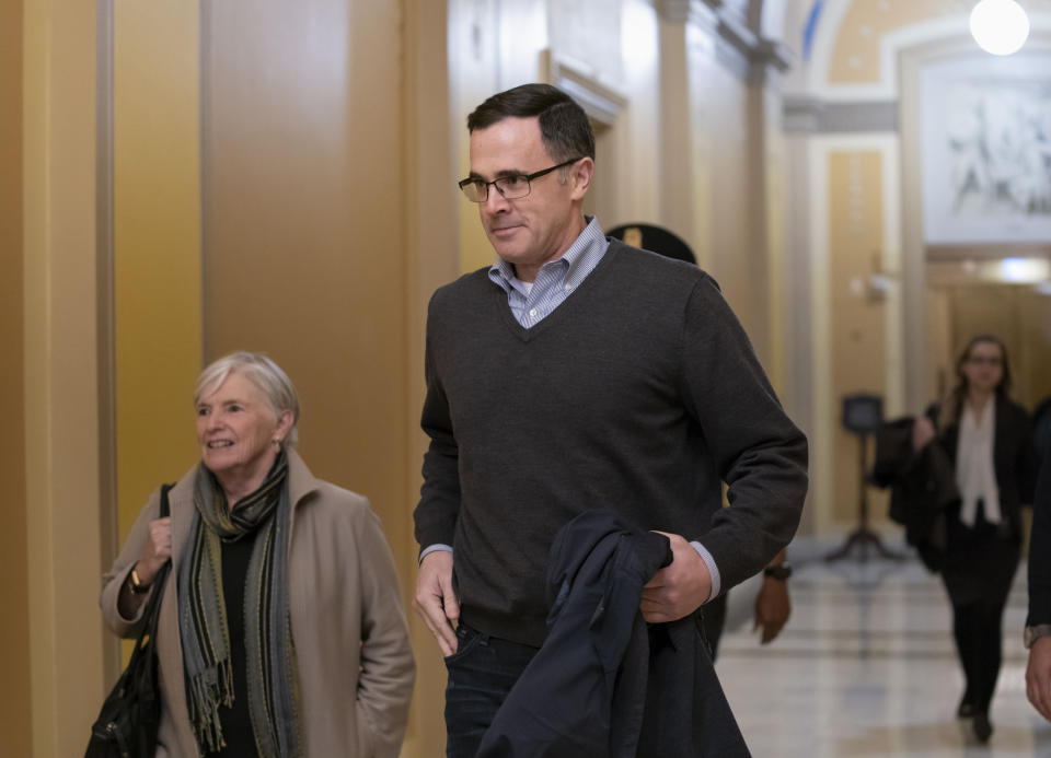 Tim Morrison, a former senior National Security Council official, arrives at the Capitol to review his previous testimony in the impeachment inquiry of President Donald Trump, in Washington, Wednesday, Nov. 6, 2019. (AP Photo/J. Scott Applewhite)