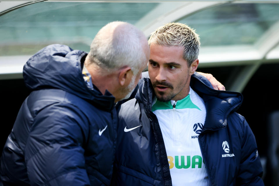 Graham Arnold embraces Jamie Maclaren.