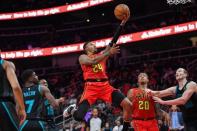 Nov 25, 2018; Atlanta, GA, USA; Atlanta Hawks guard Kent Bazemore (24) drives to the basket against the Charlotte Hornets during the second half at State Farm Arena. Mandatory Credit: Dale Zanine-USA TODAY Sports