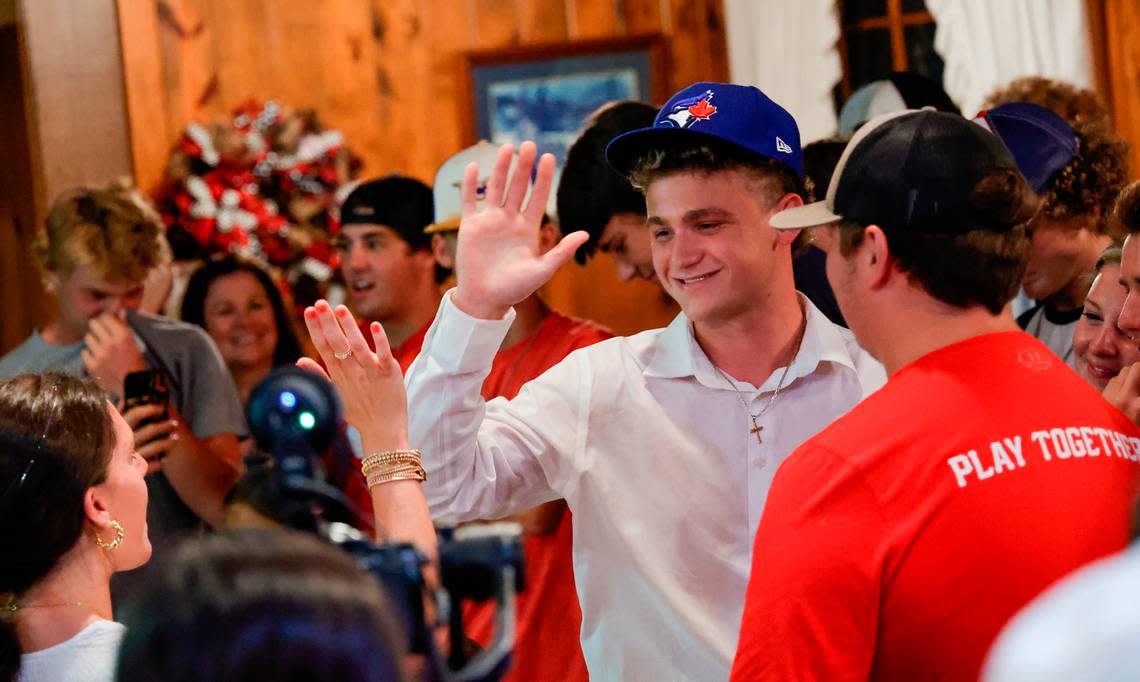 Tucker Toman celebrates with family and friends after being picked to play for the Toronto Blue Jays on Sunday, July 17, 2022.