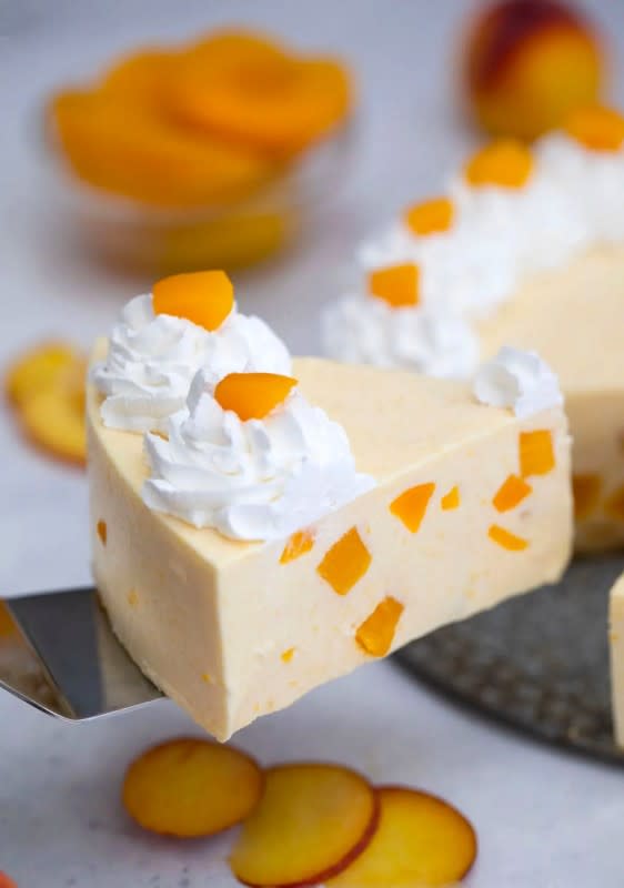 <p>Sweet and Savory Meals</p><p>No-Bake Peach Cheesecake is a sweet and summer delight that is one of the easiest desserts to make! </p><p><strong>Get the recipe: </strong><a href="https://sweetandsavorymeals.com/no-bake-peach-cheesecake/" rel="nofollow noopener" target="_blank" data-ylk="slk:No-Bake Peach Cheesecake;elm:context_link;itc:0;sec:content-canvas" class="link rapid-noclick-resp"><strong>No-Bake Peach Cheesecake</strong></a></p>