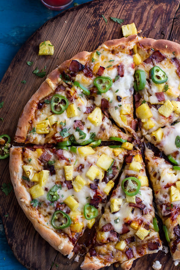 <strong>Get the <a href="http://www.halfbakedharvest.com/tj-hooker-pizza-chipotle-bbq-sweet-chili-pineapple-jalapeno-pizza-bacon/" target="_blank">Chipotle BBQ and Sweet Chili Pineapple pizza recipe</a> from Half Baked Harvest</strong>