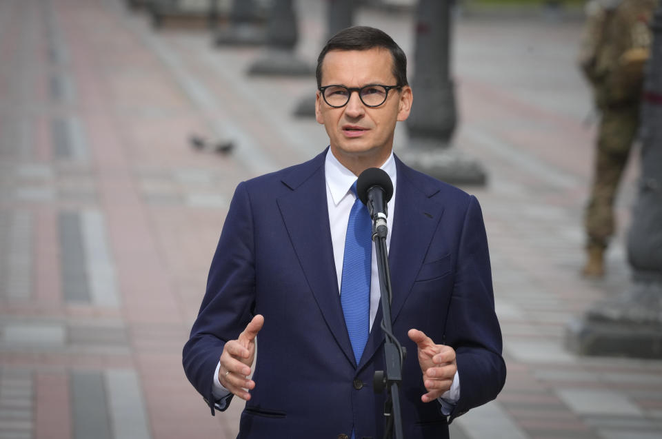 Poland's Prime Minister Mateusz Morawiecki speaks during joint press conference with Ukrainian President Volodymyr Zelenskyy and Latvian President Egils Levits in Kyiv, Ukraine, Friday, Sept. 9, 2022. (AP Photo/Efrem Lukatsky)