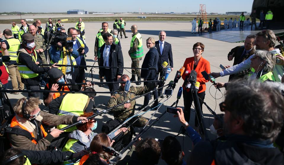 German Defence Minister Annegret Kramp-Karrenbauer speaks to the media during a delivery of protective masks from China on April 27, 2020 at the airport of Leipzig, eastern Germany. (Photo by Ronny Hartmann / AFP) (Photo by RONNY HARTMANN/AFP via Getty Images)