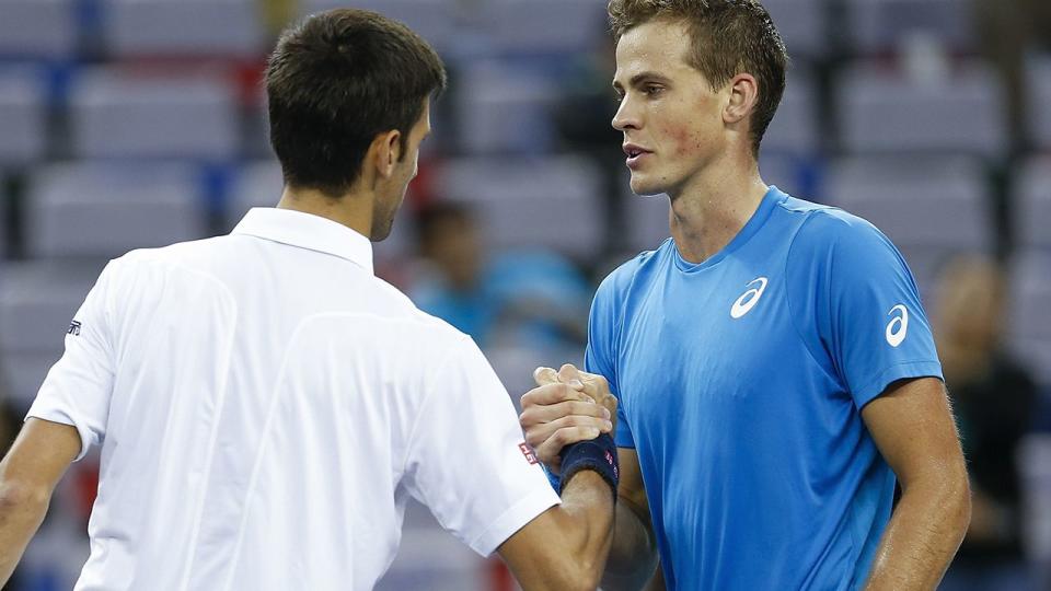 Djokovic and Pospisil. Image: Getty