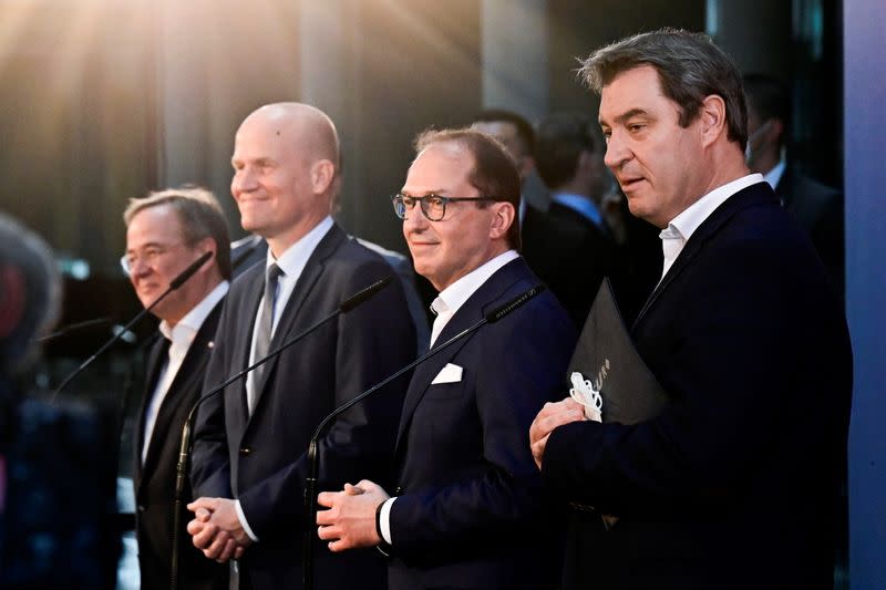 Armin Laschet, Ralph Brinkhaus, Alexander Dobrindt and Markus Soeder attend a news conference in Berlin