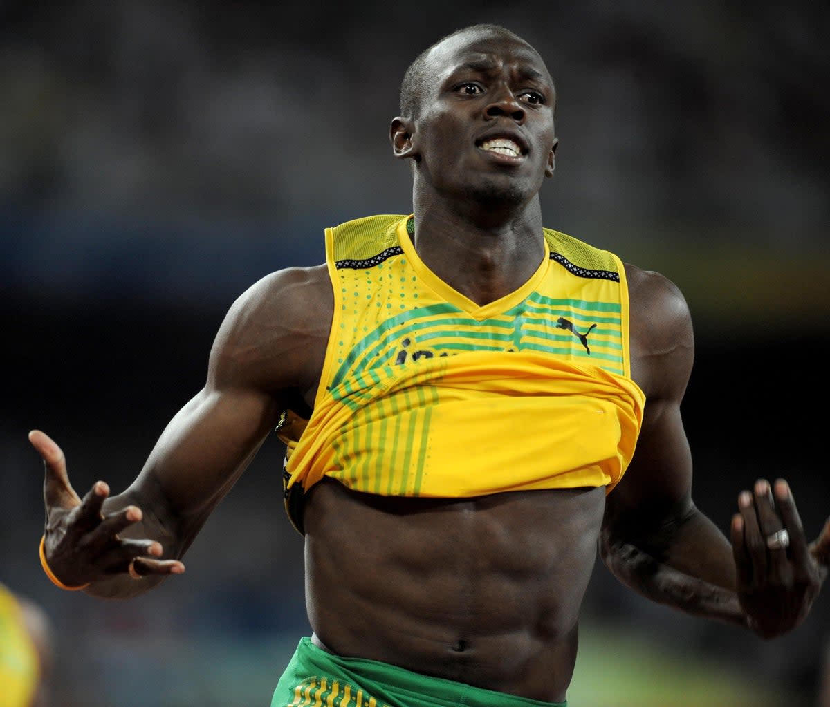 Usain Bolt celebrates his 100 metres victory in Beijing (Gareth Copley/PA) (PA Archive)